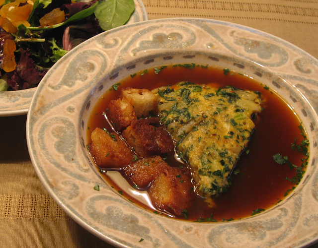 Frittata of greens and onion in beef stock with croutons Frittata of greens and onion in beef stock with croutons